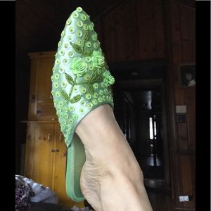 Bejeweled green slippers